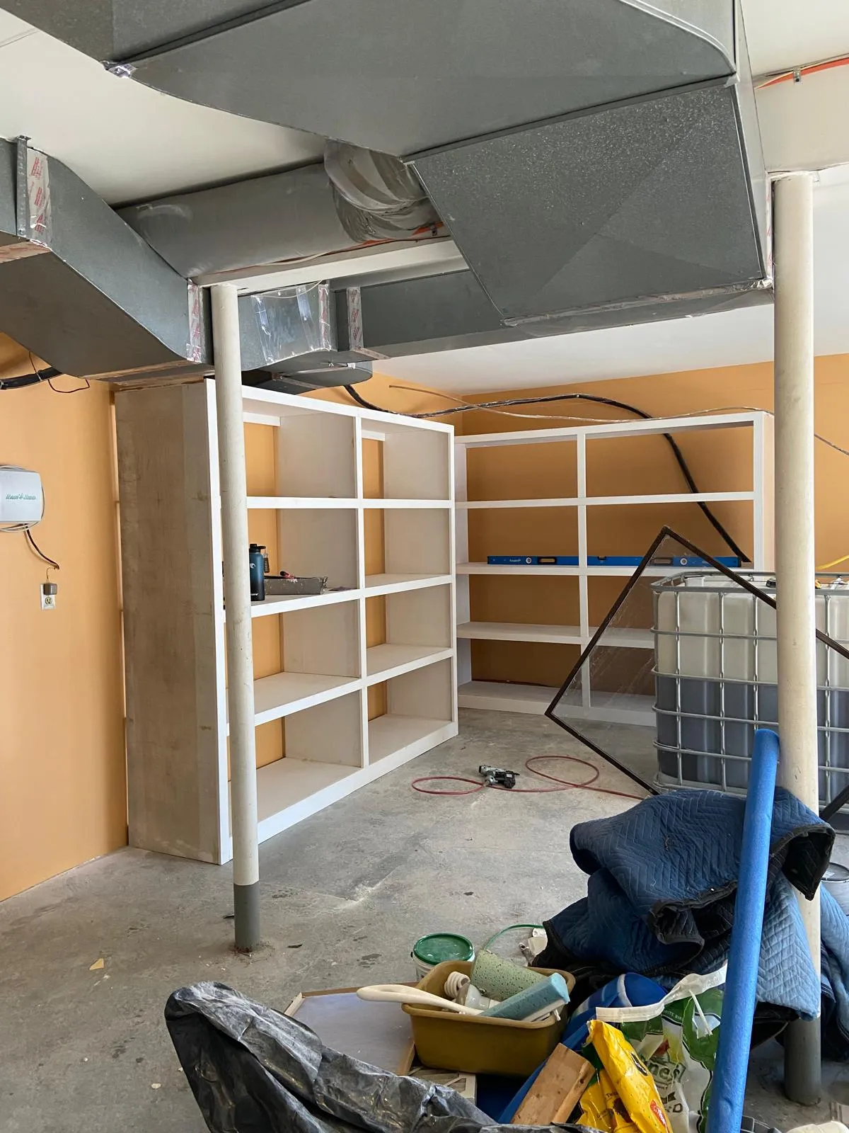 Basement remodel with built-ins by Mosquera Construction in Connecticut