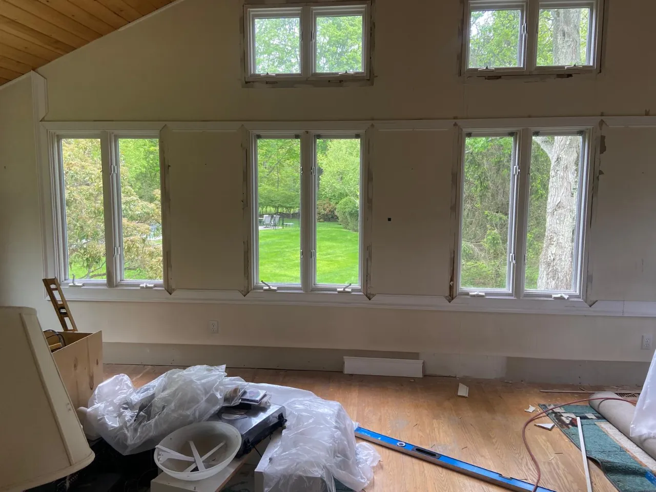 Living room with large windows freshly painted by Mosquera Construction in Connecticut