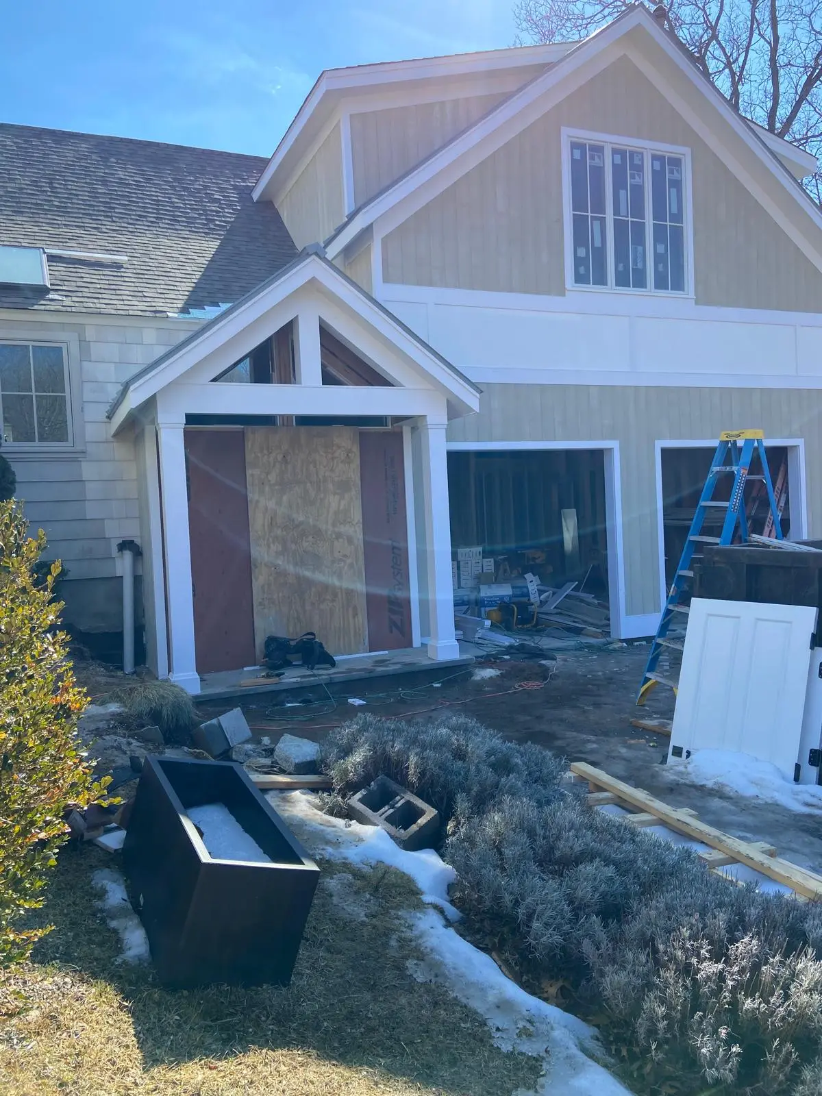 Addition with a gable entry under construction by Mosquera Construction in Connecticut