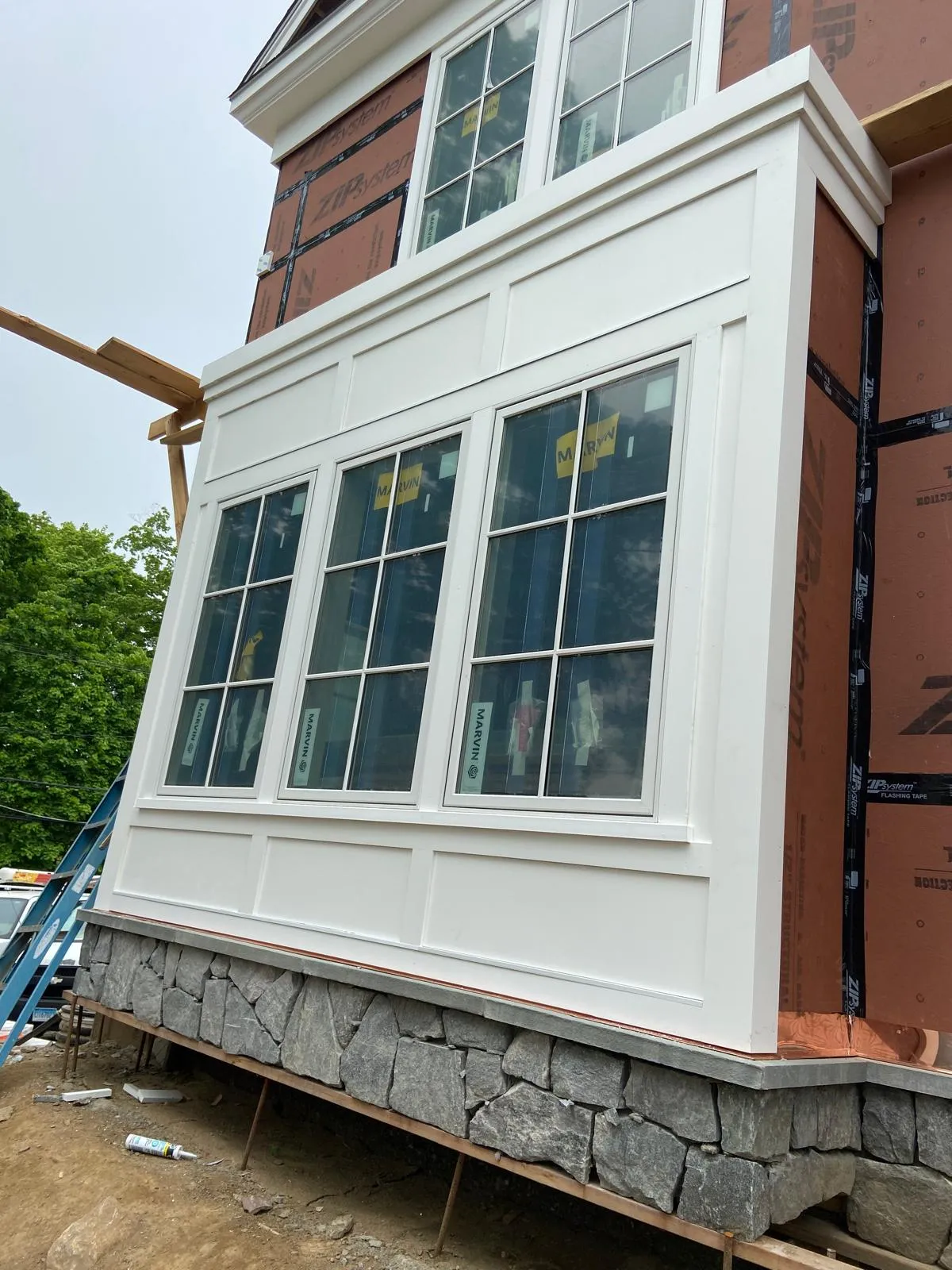 New exterior trim on a bay window by Mosquera Construction in Connecticut