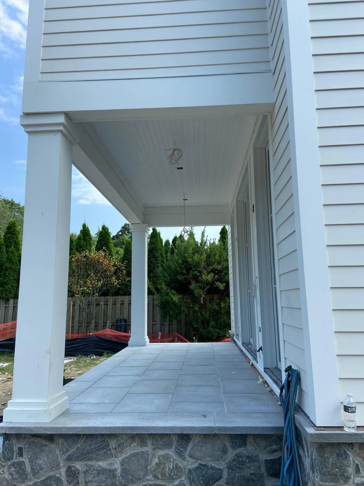 Porch with columns by Mosquera Construction in Connecticut