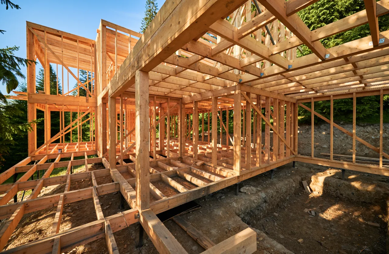 Wood-framed house under a blue sky