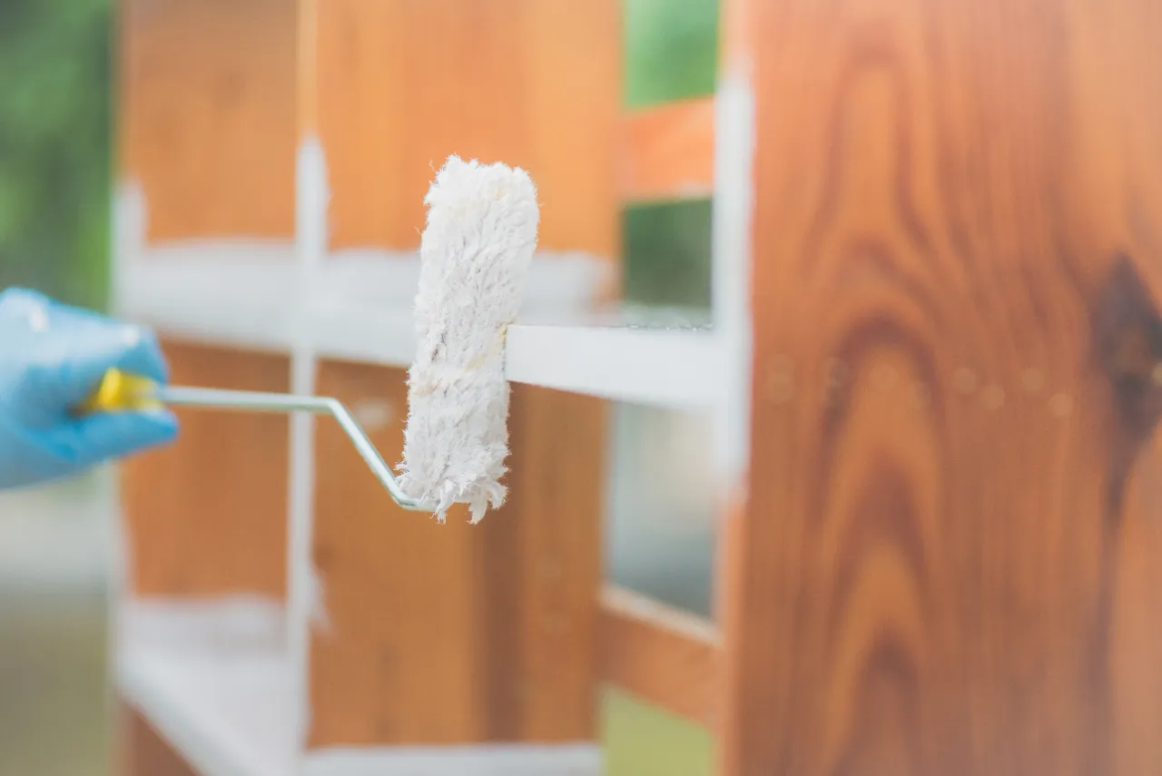 Painting a cabinet with a roller
