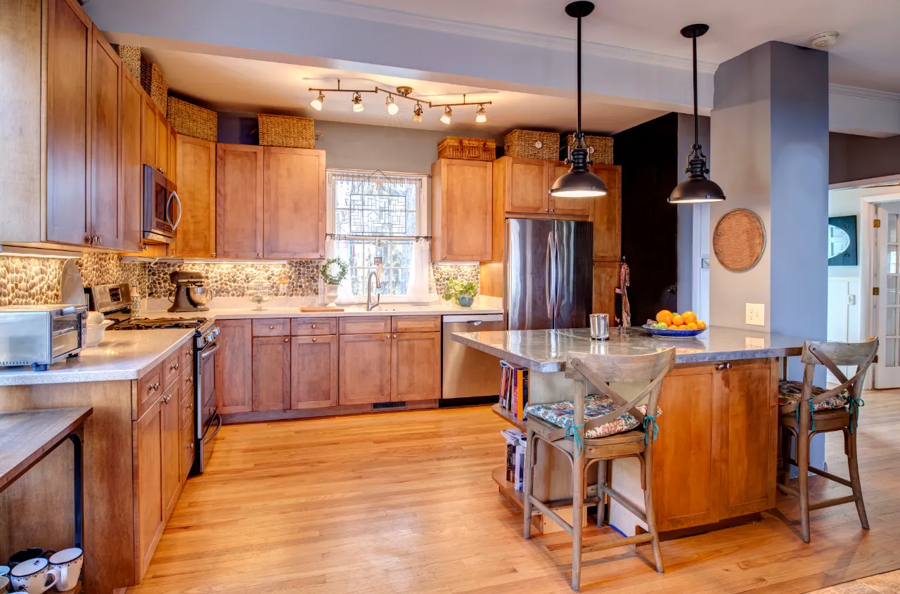 Finished kitchen with wood cabinets